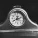 black and white analog alarm clock